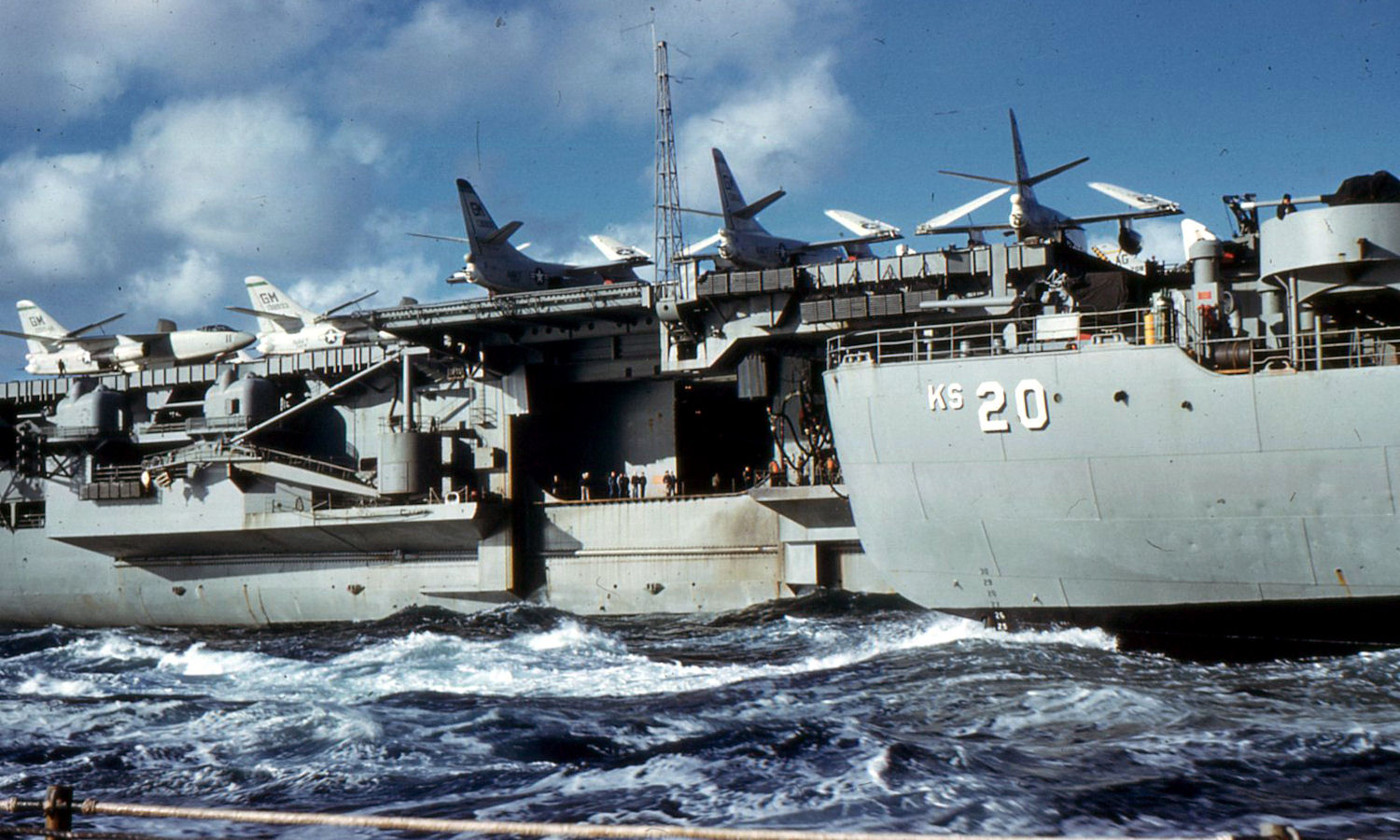 USS Haynsworth, alongside of Reefer refreshing the USS Saratoga’s supplies.